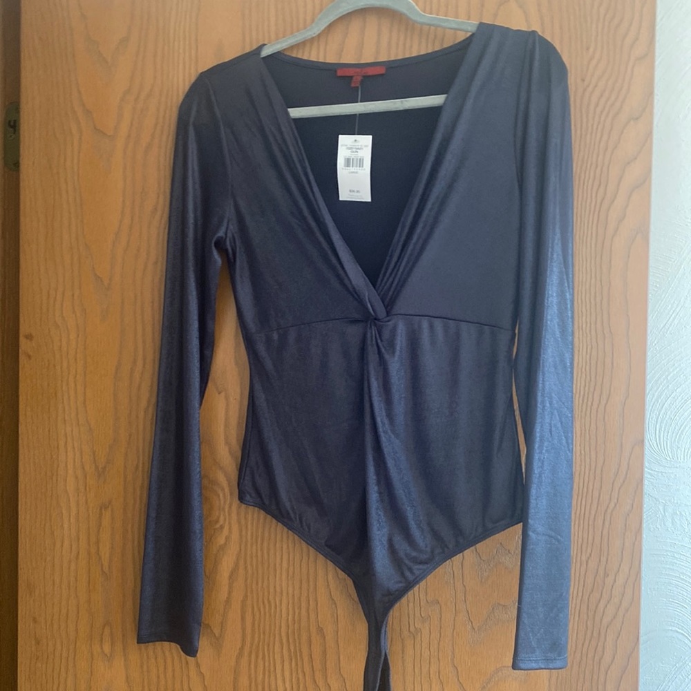 Metallic body suit from buckle